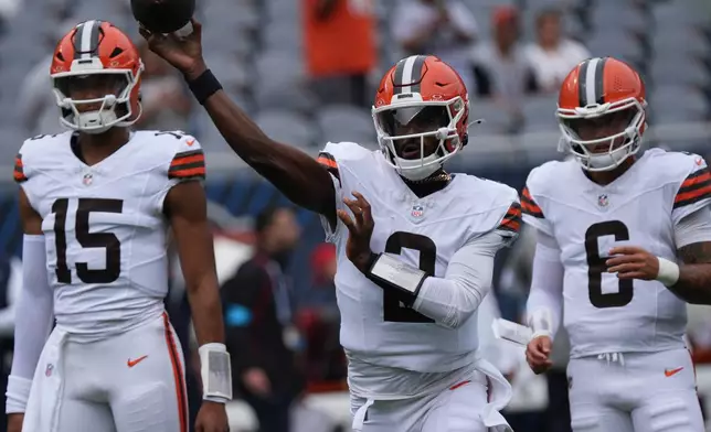 FILE - Cleveland Browns quarterback Shedeur Sanders warms up before a an NFL preseason football game in Chicago, Aug. 15, 2026 (AP Photo/David Banks, File)
