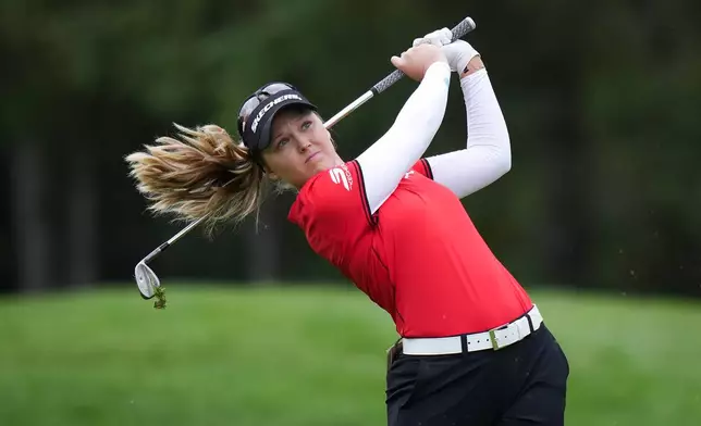 Canada's Brooke Henderson hits her second shot on the fourth hole during the first round at the LPGA Canadian Women's Open golf tournament in Edmonton, Alberta, Thursday, Aug. 20, 2026. (Darryl Dyck/The Canadian Press via AP)