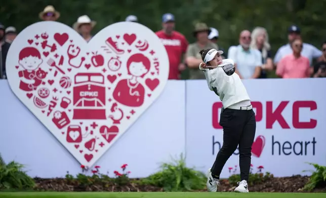 Miyu Yamashita, of Japan, hits her tee shot on the ninth hole during the first round at the LPGA Canadian Women's Open golf tournament in Edmonton, Alberta, Thursday, Aug. 20, 2026. (Darryl Dyck/The Canadian Press via AP)
