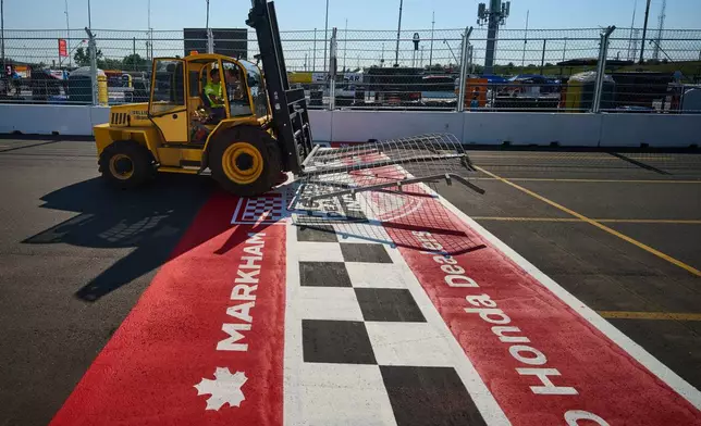 Track preparations remain underway ahead of the 2026 Honda Indy in Markham, Ont., Friday, Aug. 14, 2026.(Sammy Kogan /The Canadian Press via AP)