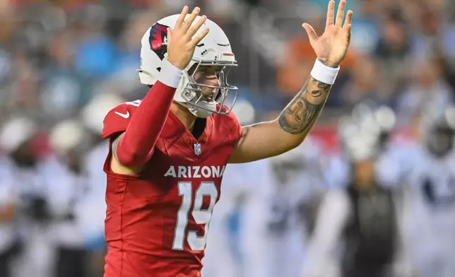 Arizona Cardinals quarterback Carson Beck (19) celebrates the rushing touchdown of teammate Corey Kiner in the first half of the Pro Football Hall of Fame NFL preseason game against the Carolina Panthers in Canton, Ohio, Thursday, Aug. 6, 2026. (AP Photo/David Richard)