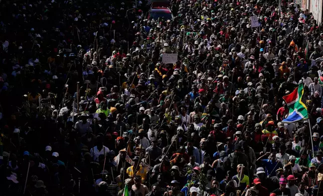 FILE - Protesters march against illegal immigration, in Johannesburg, South Africa, on June 30, 2026. (AP Photo/Themba Hadebe, file)