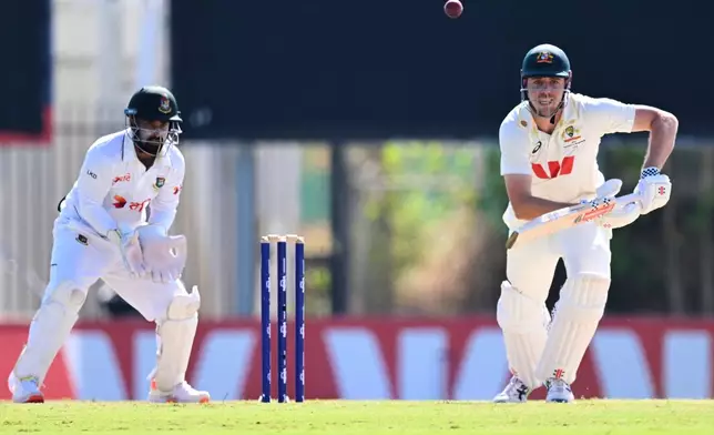 Cameron Green of Australia bats during play on day four of the first cricket test against Bangladesh in Darwin, Australia, Sunday, Aug. 16, 2026. (James Ross/AAP Image via AP)