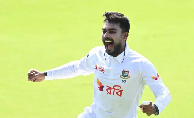 Mehidy Hasan Miraz of Bangladesh celebrates after dismissing Beau Webster of Australia during play on day four of the first cricket test in Darwin, Australia, Sunday, Aug. 16, 2026. (James Ross/AAP Image via AP)