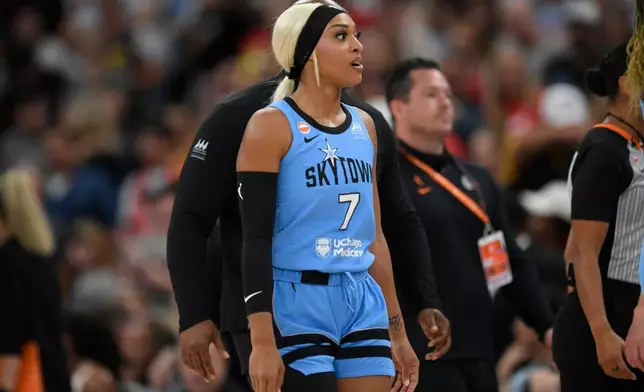 Chicago Sky's DiJonai Carrington walks off the court ejected from the game for committing a flagrant foul against Indiana Fever's Sophie Cunningham during the first half of an WNBA basketball game in Chicago, Saturday, Aug. 8, 2026. (AP Photo/Paul Beaty)