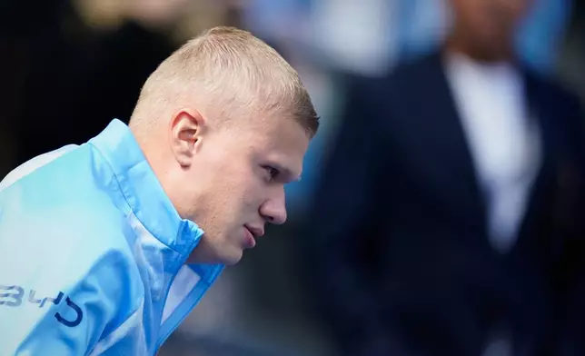 Manchester City's Erling Haaland warms up prior to the English Premier League soccer match between Manchester City and Bournemouth in Manchester, England, Sunday, Aug. 23, 2026. (AP Photo/Dave Thompson)
