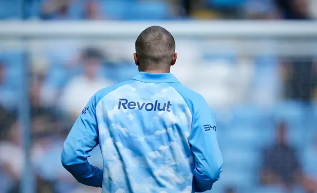 Manchester City's Erling Haaland warms up prior to the English Premier League soccer match between Manchester City and Bournemouth in Manchester, England, Sunday, Aug. 23, 2026. (AP Photo/Dave Thompson)