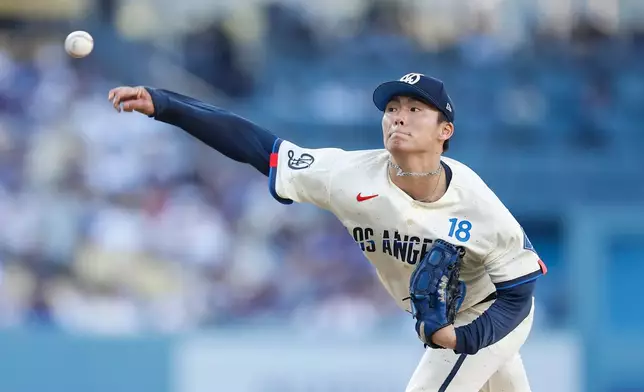 Los Angeles Dodgers starting pitcher Yoshinobu Yamamoto (18) throws during the second inning of a baseball game against the Boston Red Sox, Saturday, Aug. 1, 2026, in Los Angeles. (AP Photo/Caroline Brehman)