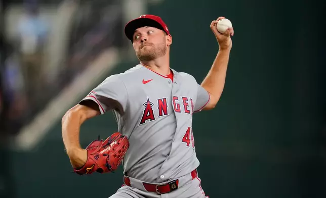 Los Angeles Angels pitcher Reid Detmers throws to the Texas Rangers in the first inning of a baseball game Friday, Aug. 21, 2026, in Arlington, Texas. (AP Photo/Tony Gutierrez)