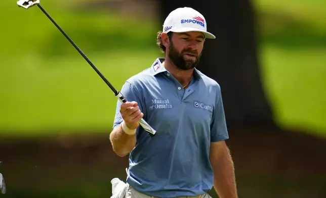 Cameron Young walks to the nineth green during the first round of the St. Jude Championship golf tournament, Thursday, Aug. 13, 2026, in Memphis, Tenn. (AP Photo/George Walker IV)