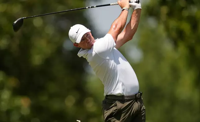 Rory McIlroy, of Northern Ireland, tees off on the seventh hole during the second round of the St. Jude Championship golf tournament Friday, Aug. 14, 2026, in Memphis, Tenn. (AP Photo/George Walker IV)