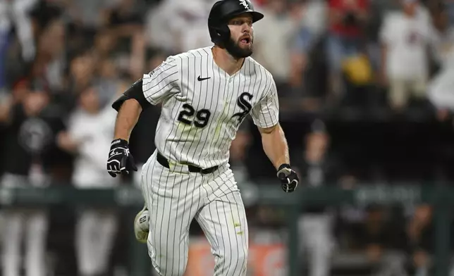 Chicago White Sox's Tristan Peters watches his two-run home during the fifth inning of a baseball game against the Texas Rangers in Chicago, Wednesday, Aug. 26, 2026. (AP Photo/Paul Beaty)