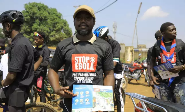 Residents and frontline workers embark on Ebola outbreak awareness campaign in Beni, North Kivu province, eastern Congo, Friday, Aug. 21, 2026. (AP Photo/Sebastien Kitsa Musayi)
