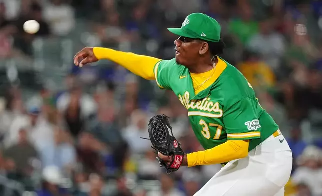 Athletics pitcher Elvis Alvarado throws in the ninth inning of a baseball game against the Minnesota Twins Wednesday, Aug. 26, 2026, in West Sacramento, Calif. (AP Photo/Alan Greth)