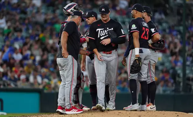 Minnesota Twins pitcher Connor Prielipp (61) walks off the mound after being pulled from the game in the sixth inning during a baseball game against the Athletics Wednesday, Aug. 26, 2026, in West Sacramento, Calif. (AP Photo/Alan Greth)