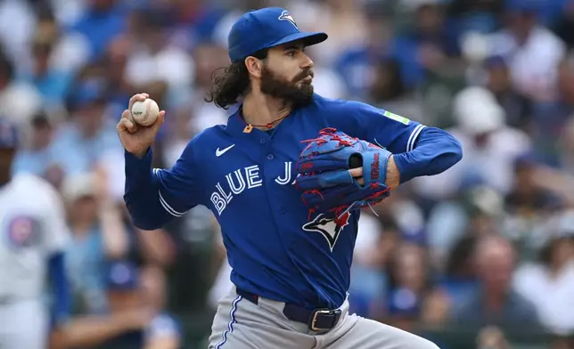 Toronto Blue Jays starter Dylan Cease delivers a pitch during the first inning of a baseball game against the Chicago Cubs in Chicago, Thursday, Aug. 6, 2026. (AP Photo/Paul Beaty)