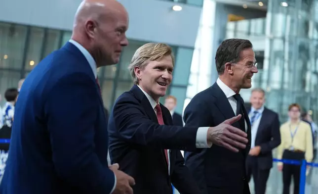 From left, U.S. Ambassador to NATO Matthew Whitaker, U.S. Undersecretary of Defense Elbridge Colby and NATO Secretary General Mark Rutte walk together after addressing the media at NATO headquarters in Brussels, Thursday, Aug. 27, 2026. (AP Photo/Virginia Mayo)