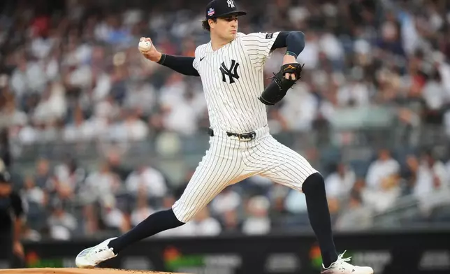 New York Yankees' Cam Schlittler pitches dfirst inning of a baseball game against the Toronto Blue Jays Friday, Aug. 21, 2026, in New York. (AP Photo/Frank Franklin II)
