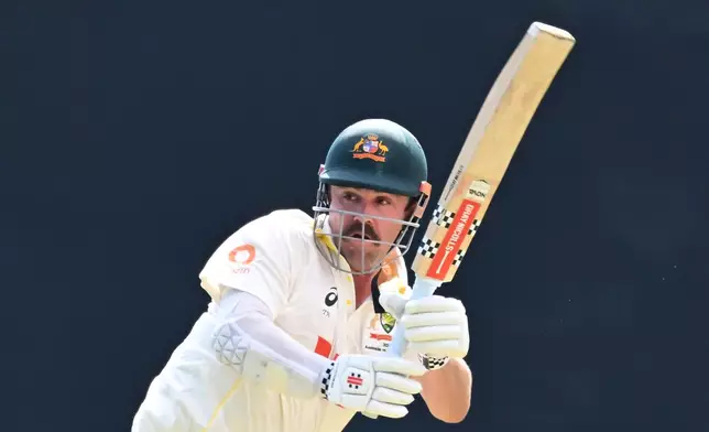 Australia's Travis Head bats against Bangladesh during their cricket test match in Darwin, Australia, Thursday, Aug. 13, 2026. (James Ross/AAP Image via AP)