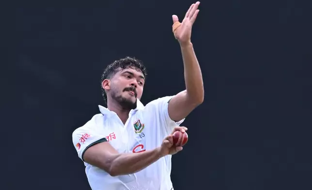 Bangladesh's Taskin Ahmed bowls to Australia during their cricket test match in Darwin, Australia, Thursday, Aug. 13, 2026. (James Ross/AAP Image via AP)