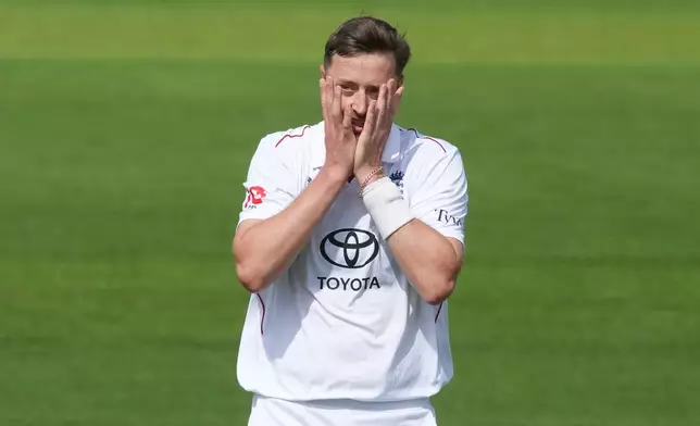 England's Ollie Robinson reacts after bowling a delivery on day four of the second cricket test match between England and Pakistan in London, Sunday, Aug. 30, 2026. (AP Photo/Dave Shopland)