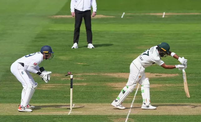 Pakistan's Abdullah Shafique is bowled out by England's Ollie Robinson on day four of the second cricket test match between England and Pakistan in London, Sunday, Aug. 30, 2026. (AP Photo/Dave Shopland)