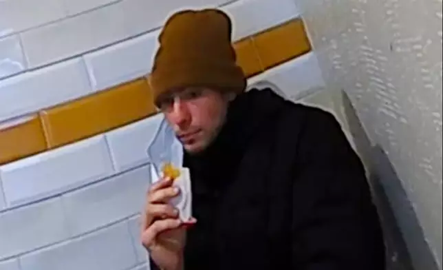 FILE - This image release by Pennsylvania State Police shows a video image of Luigi Mangione, a suspect in the fatal shooting of UnitedHealthcare CEO Brian Thompson, at a McDonald's in Altoona, Pa., Monday, Dec. 9, 2024. (Pennsylvania State Police via AP, File)