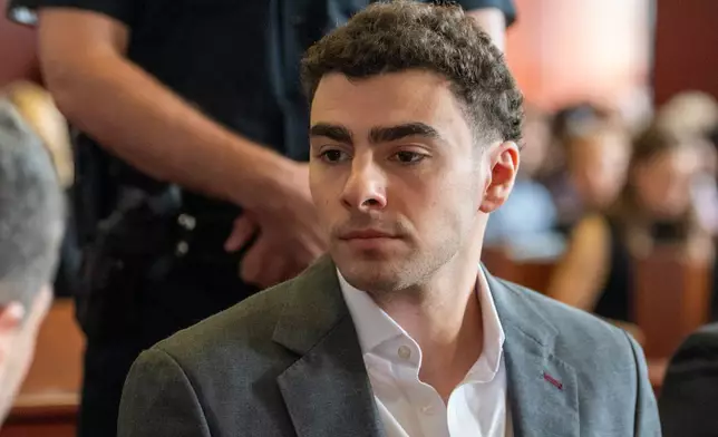 Luigi Mangione appears for a pre-trial hearing at Manhattan Criminal Court in New York, on Tuesday, Aug. 11, 2026. (David Dee Delgado/Pool Photo via AP)