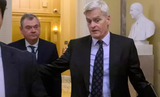 Sen. Bill Cassidy, R-La., departs the U.S. Capitol prior to a confirmation vote for acting Attorney General Todd Blanche, Friday, Aug. 7, 2026, in Washington. (AP Photo/Rod Lamkey, Jr.)