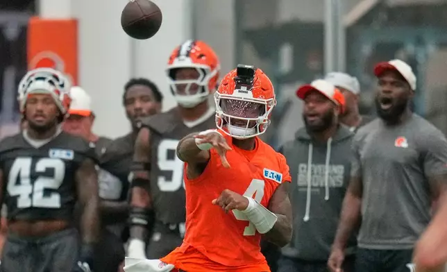 Cleveland Browns quarterback Deshaun Watson passes during the team's NFL football training camp, Monday, Aug. 10, 2026, in Berea, Ohio. (AP Photo/Sue Ogrocki)