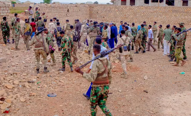 Government troops patrol alongside government officials after clashes with militias that killed dozens of people, including civilians, in Baidoa, Somalia, Monday, Aug. 17, 2026. (AP Photo)