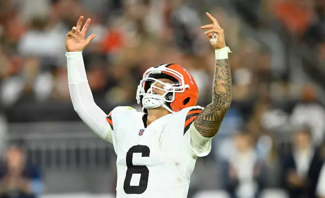 Cleveland Browns quarterback Dillion Gabriel celebrates after throwing a touchdown pass against the New England Patriots during the first half of a preseason NFL football game Thursday, Aug. 27, 2026, in Cleveland. (AP Photo/David Richard)