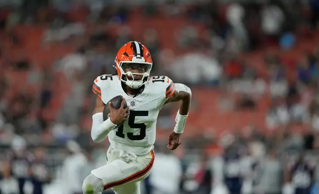 Cleveland Browns quarterback Taylen Green runs for a gain against the New England Patriots during the second half of a preseason NFL football game Thursday, Aug. 27, 2026, in Cleveland. (AP Photo/Carolyn Kaster)