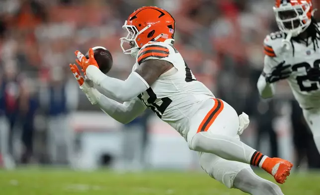 Cleveland Browns' Easton Mascarenas-Arnold intercepts a pass against the New England Patriots during the first half of a preseason NFL football game Thursday, Aug. 27, 2026, in Cleveland. (AP Photo/Carolyn Kaster)