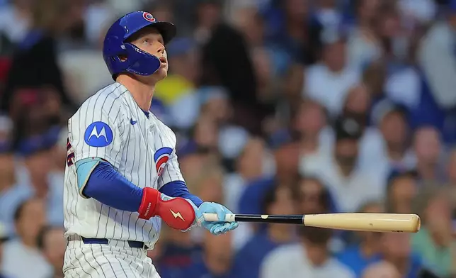 Chicago Cubs' Pete Crow-Armstrong watches his home run during the first inning of a baseball game against the Chicago White Sox, Tuesday, Aug. 18, 2026, in Chicago. (AP Photo/Melissa Tamez)