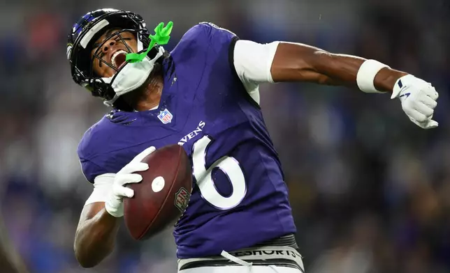 Baltimore Ravens wide receiver Ja'Kobi Lane celebrates after scoring a touchdown against the Philadelphia Eagles during the first half of an NFL preseason football game Saturday, Aug. 15, 2026, in Baltimore. (AP Photo/Nick Wass)