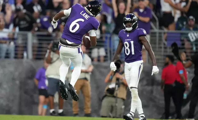 Baltimore Ravens wide receiver Ja'Kobi Lane (6) celebrates after scoring a touchdown against the Philadelphia Eagles during the first half of an NFL preseason football game Saturday, Aug. 15, 2026, in Baltimore. (AP Photo/Stephanie Scarbrough)