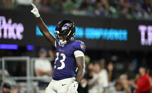 Baltimore Ravens running back Adam Randall celebrates after scoring a touchdown against the Philadelphia Eagles during the second half of an NFL preseason football game Saturday, Aug. 15, 2026, in Baltimore. (AP Photo/Nick Wass)