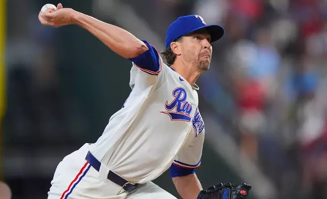 Texas Rangers starting pitcher Jacob deGrom throws during the first inning of a baseball game against the Baltimore Orioles, Saturday, Aug. 8, 2026, in Arlington, Texas. (AP Photo/LM Otero)