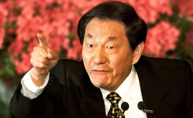 FILE - Chinese Premier Zhu Rongji speaks during a news conference in Beijing, Wednesday, March 15, 2000. (AP Photo/Greg Baker, File)
