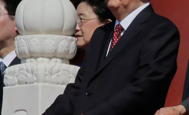 FILE - Former Chinese Premier Zhu Rongji stands during a parade commemorating the 70th anniversary of Japan's surrender during World War II held in front of Tiananmen Gate in Beijing, Thursday, Sept. 3, 2015. (AP Photo/Ng Han Guan, File)
