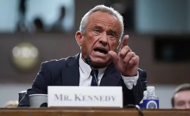 FILE - Robert F. Kennedy Jr., President Donald Trump's choice to be Secretary of Health and Human Services, appears before the Senate Finance Committee for his confirmation hearing, at the Capitol in Washington, Jan. 29, 2025. (AP Photo/Ben Curtis, file)