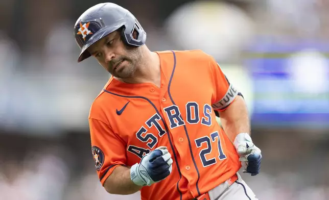 Houston Astros' Jose Altuve reacts after grounding out during the fourth inning of a baseball game against the San Diego Padres, Sunday, Aug. 9, 2026, in San Diego. (AP Photo/Karl Anderson)