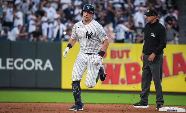 New York Yankees designated hitter Ben Rice rounds second base after hitting a solo home run during the first inning of a baseball game against the Houston Astros Wednesday, Aug. 26, 2026, in New York. (AP Photo/Ryan Murphy)