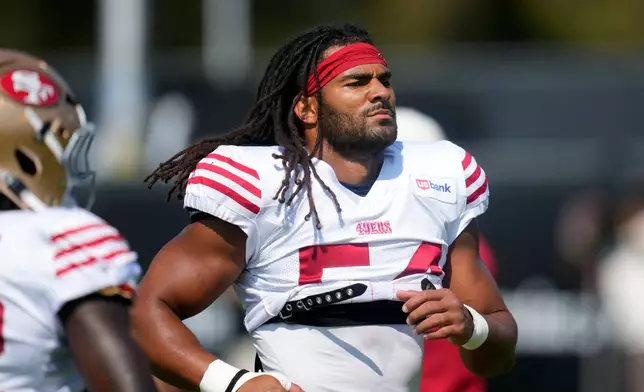 San Francisco 49ers linebacker Fred Warner (54) runs during a joint NFL training camp practice with the Tennessee Titans Tuesday, Aug. 11, 2026, in Santa Clara, Calif. (AP Photo/Jeff Chiu)