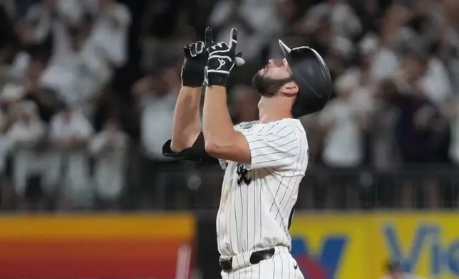 Chicago White Sox's Tristan Peters gestures after hitting a two-run double against the Cleveland Guardians during the sixth inning of a baseball game Saturday, Aug 8, 2026, in Chicago. (AP Photo/David Banks)