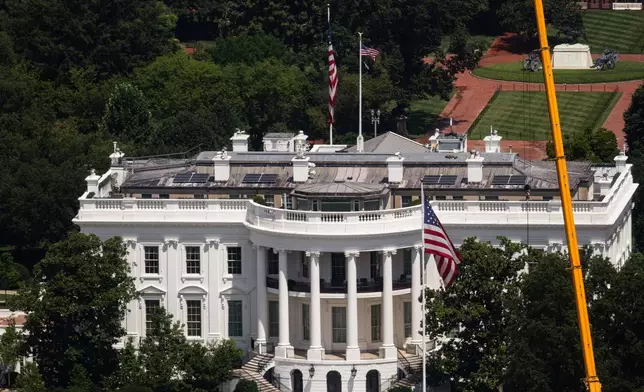 Construction continues on a helipad on the South Lawn of the White House, Wednesday, Aug. 5, 2026, in Washington. (AP Photo/Tierney L. Cross)