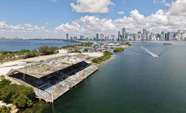The Miami Marine Stadium, facing Biscayne Bay with the skyline in the background, is seen from an aerial view Tuesday Aug. 11, 2026, in Miami. (AP Photo/Daniel Kozin)