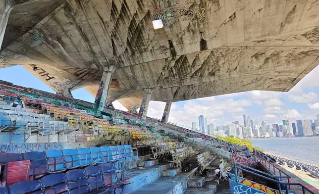 A concrete roof cantilevers over the Miami Marine Stadium on Tuesday, Aug. 11, 2026, in Miami. (AP Photo/David Fischer)