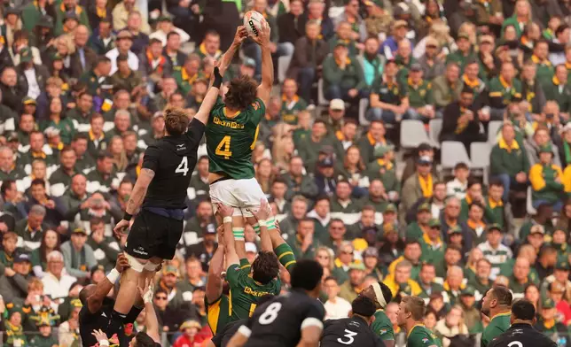 South Africa's Eben Etzebeth, top right, wins a line out against New Zealand's Fabian Holland during a second Test rugby match between South Africa and New Zealand, in Cape Town, South Africa, Saturday, Aug. 29, 2026. (AP Photo/Halden Krog)